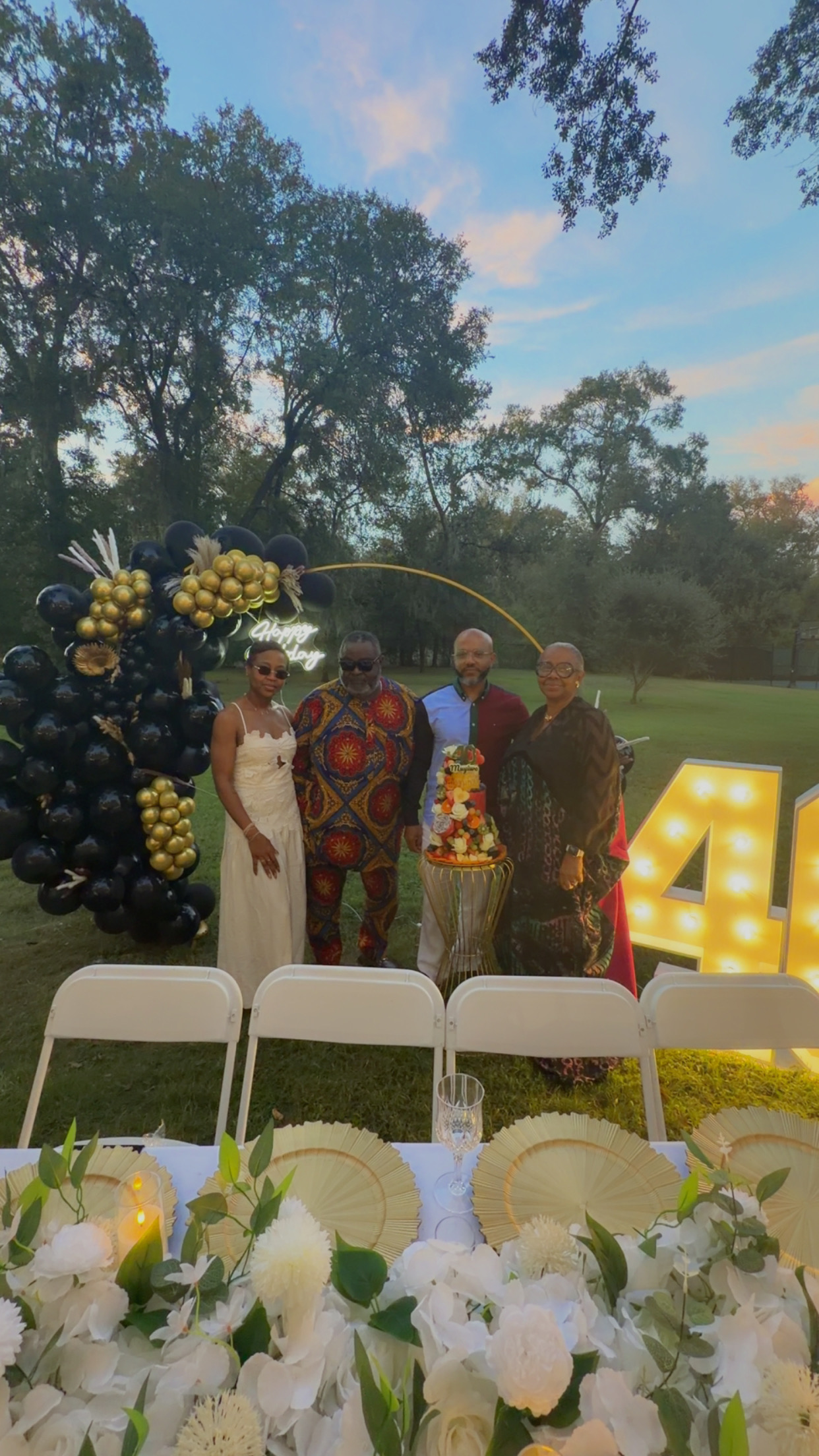 Guests at an outdoor birthday celebration